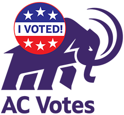 The mammoth with a button saying I Voted and underneath saying AC Votes