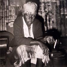Granny having a smoke - Kaith Ntuli