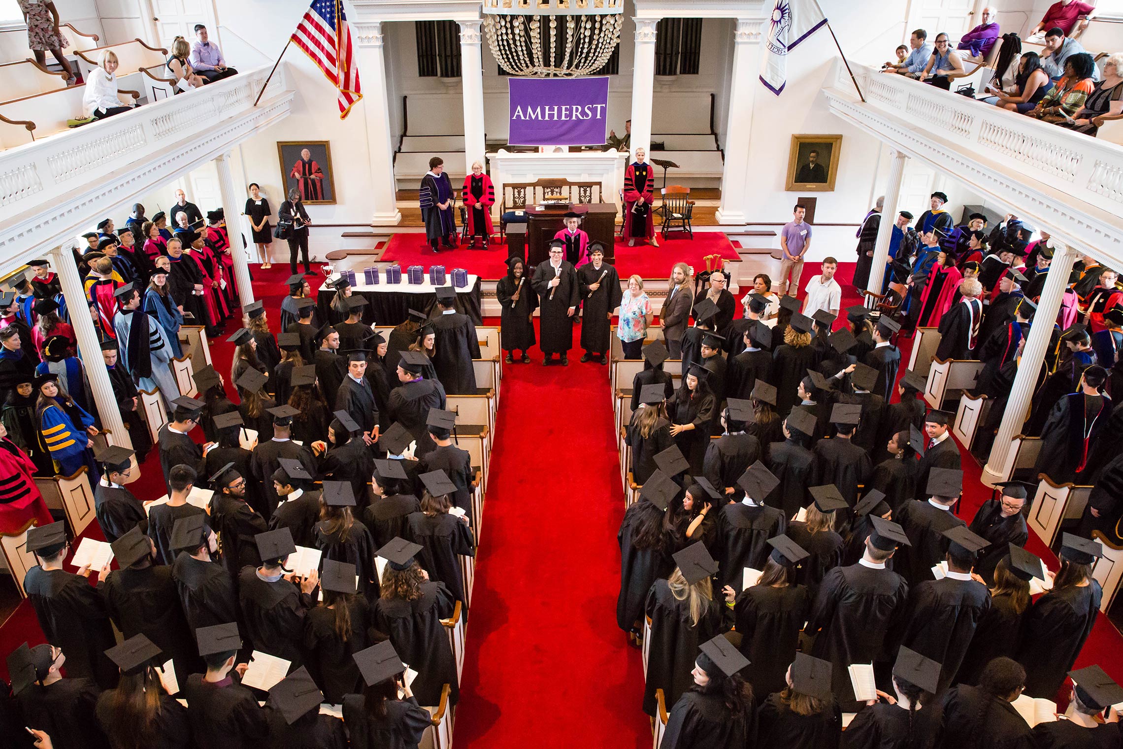 The crowd gather in Johnson Chapel, after the procession, for Senior Assembly