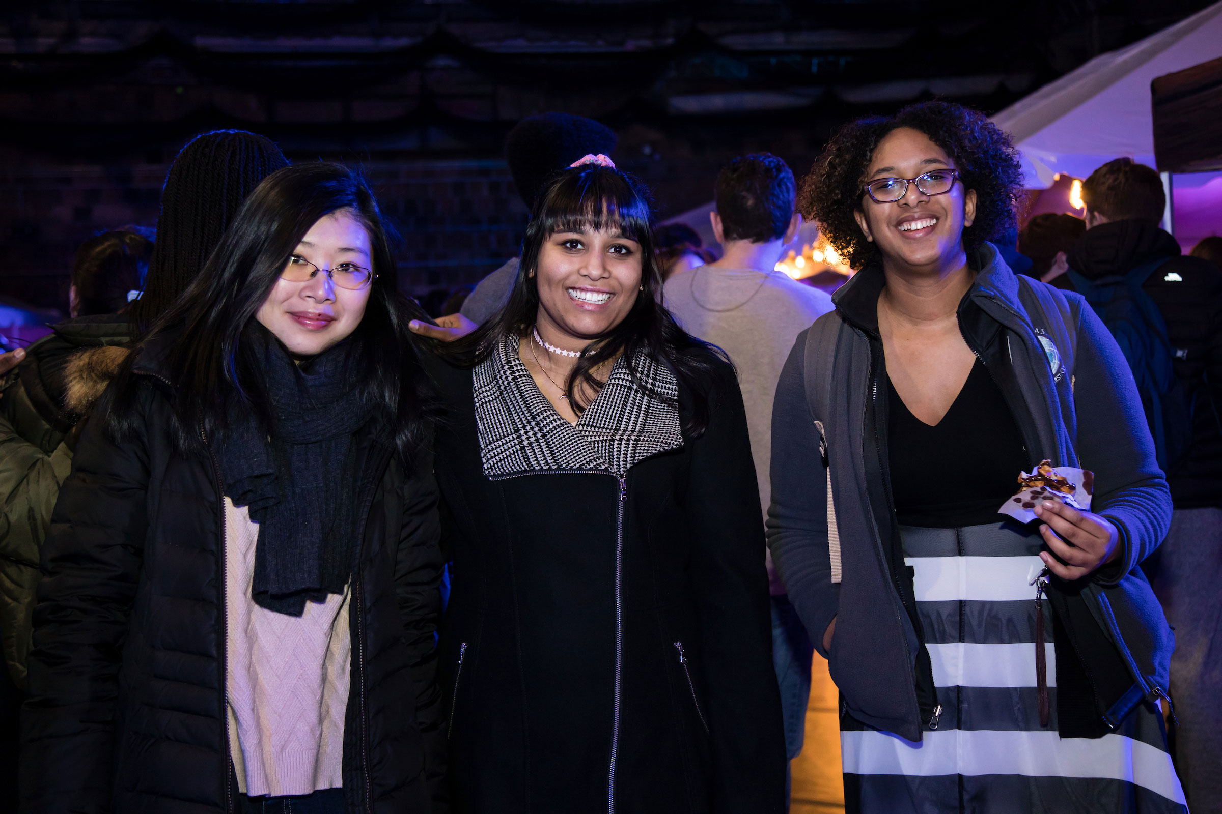Three women pose for the camera at Winter Fest
