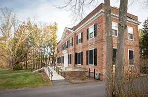 A photo of the Humphries residence hall in spring