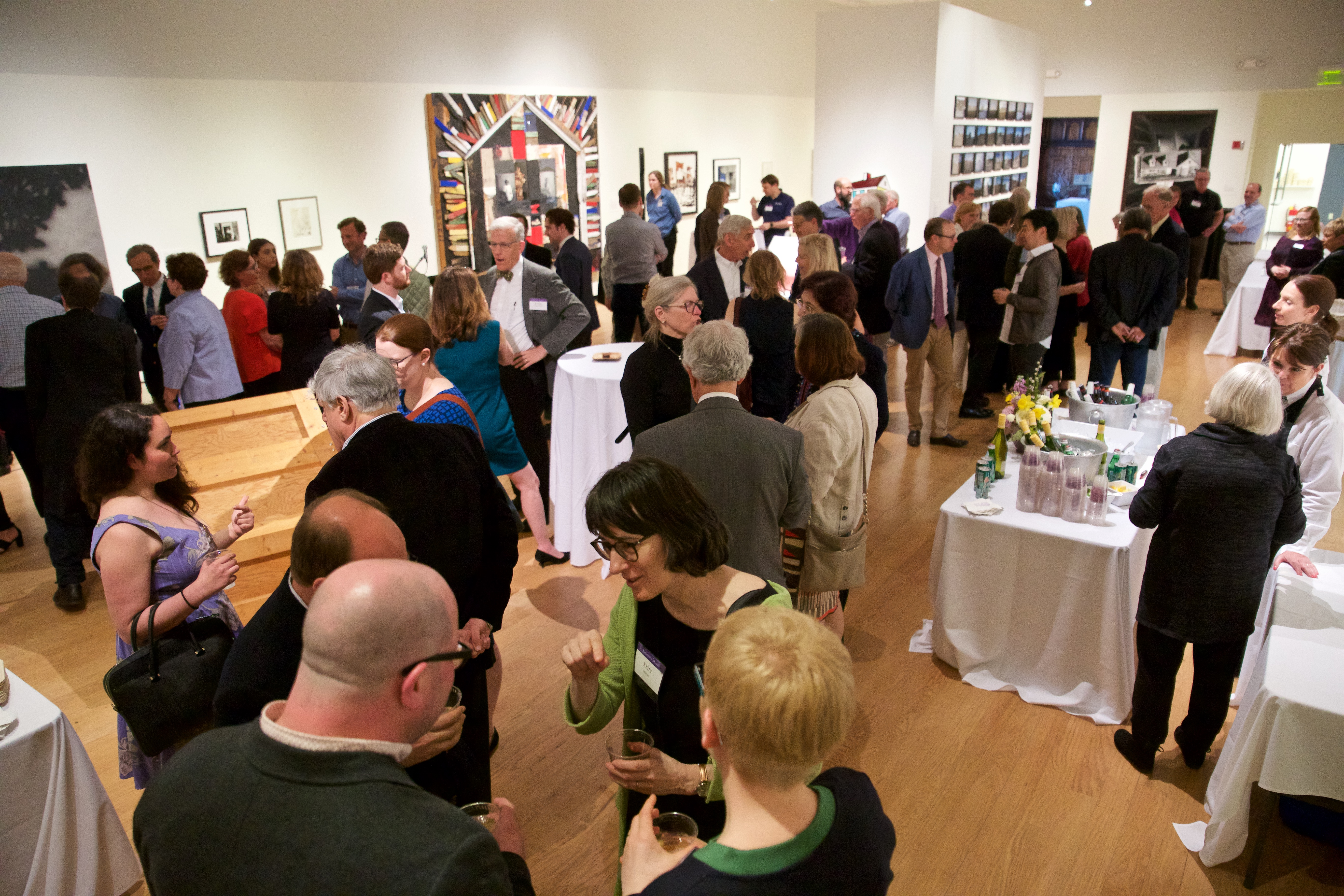 guests mingling in the Mead Art Museum at the campus event