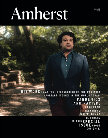 The cover of the Amherst magazine with a man in a suit on the cover