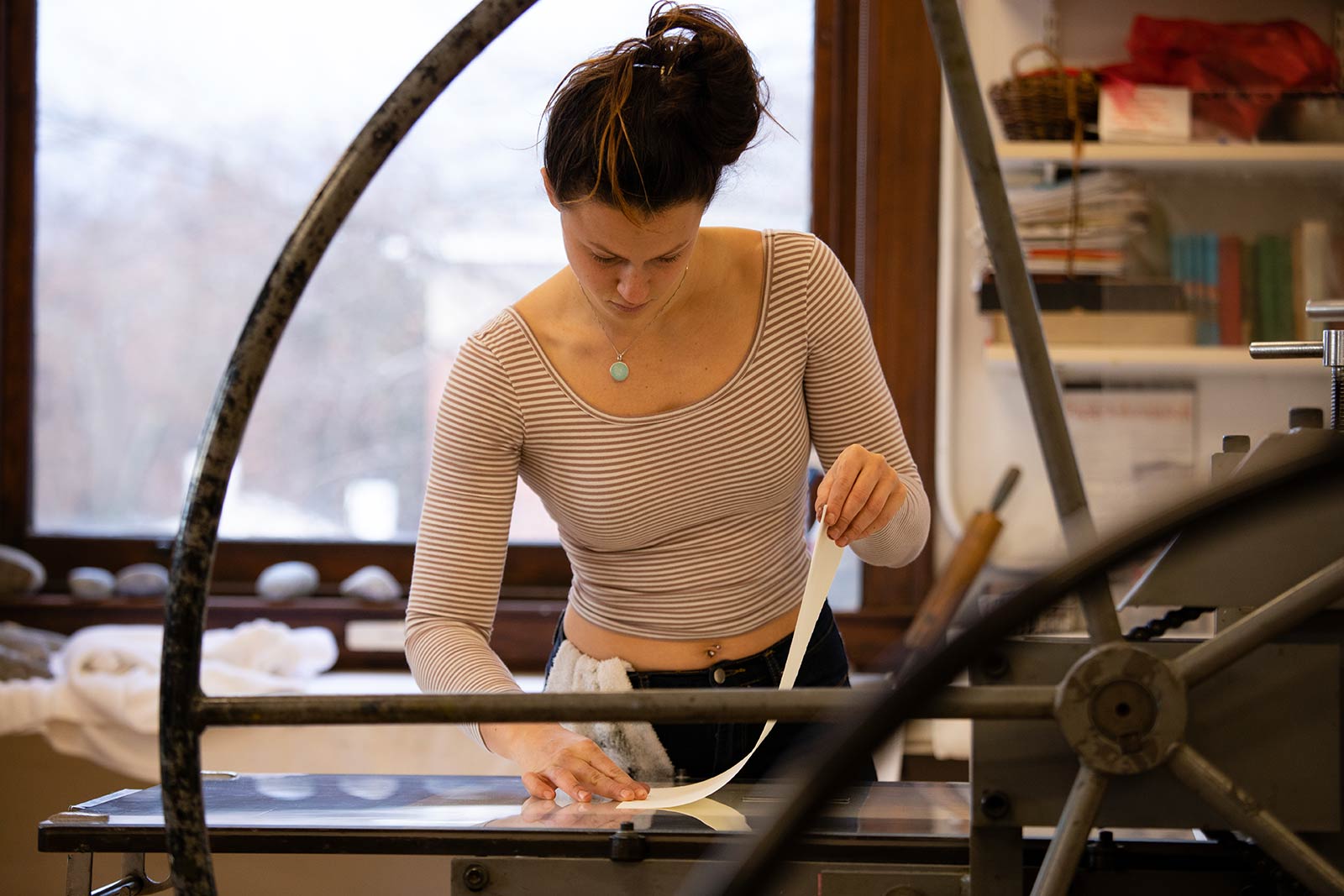 A student works on her printmaking project