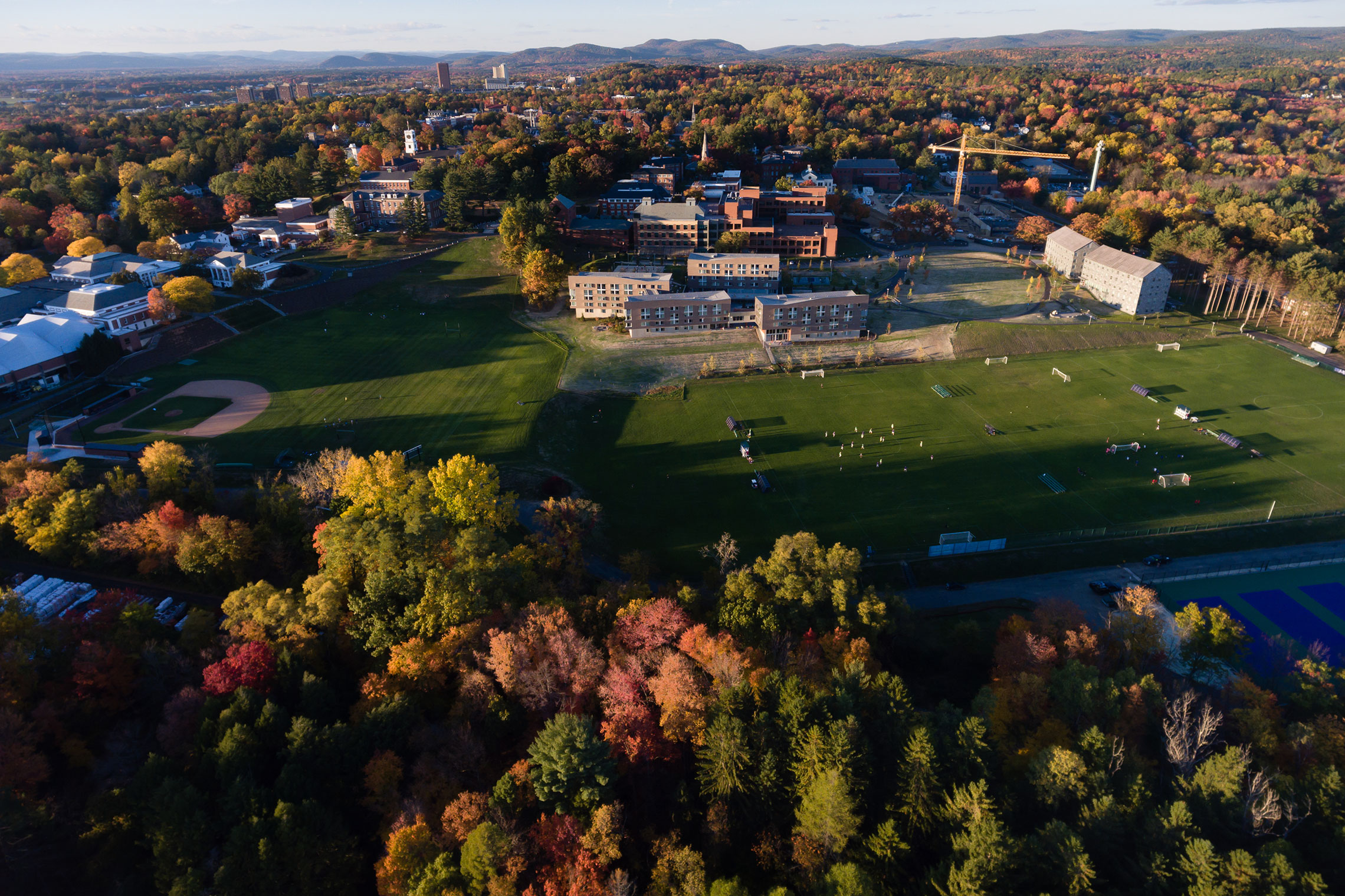 Aerial view of Amherst College campus in autumn.