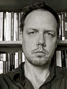 Black-and-white closeup of John Drabinski