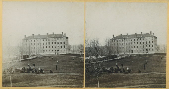 Two black and white photos of a building with a large lawn in front