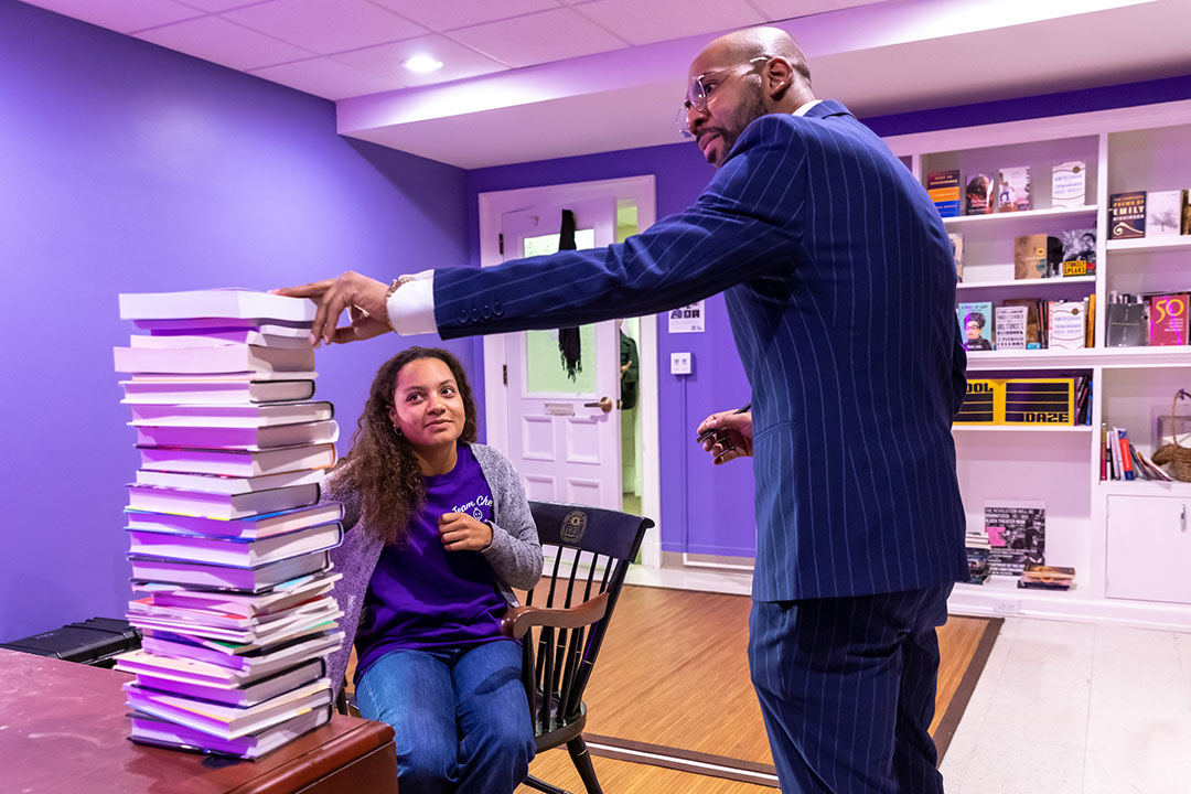 Frank Leon Roberts, Assistant Professor of English, holds office hours with Jocelyn Nichols '25.