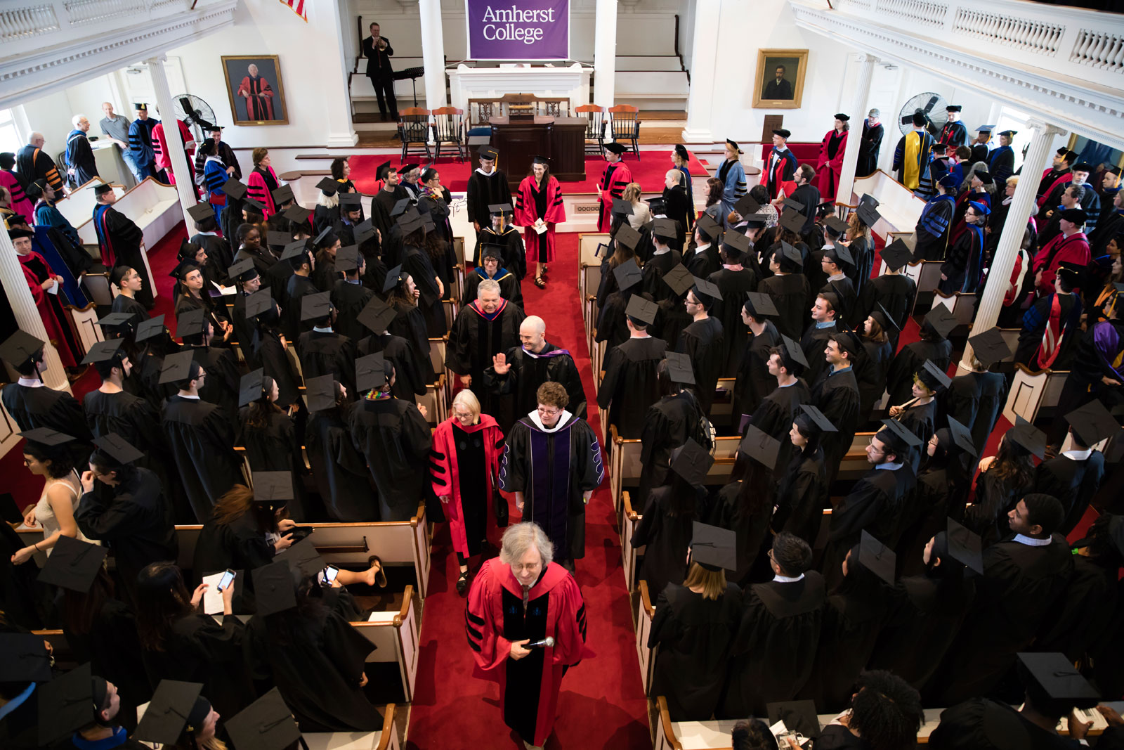 The procession of faculty enters Johnson Chapel, broader view