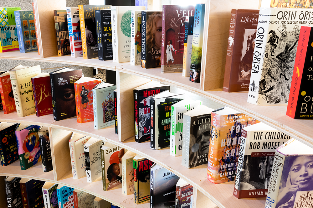 Three bookshelves filled with books