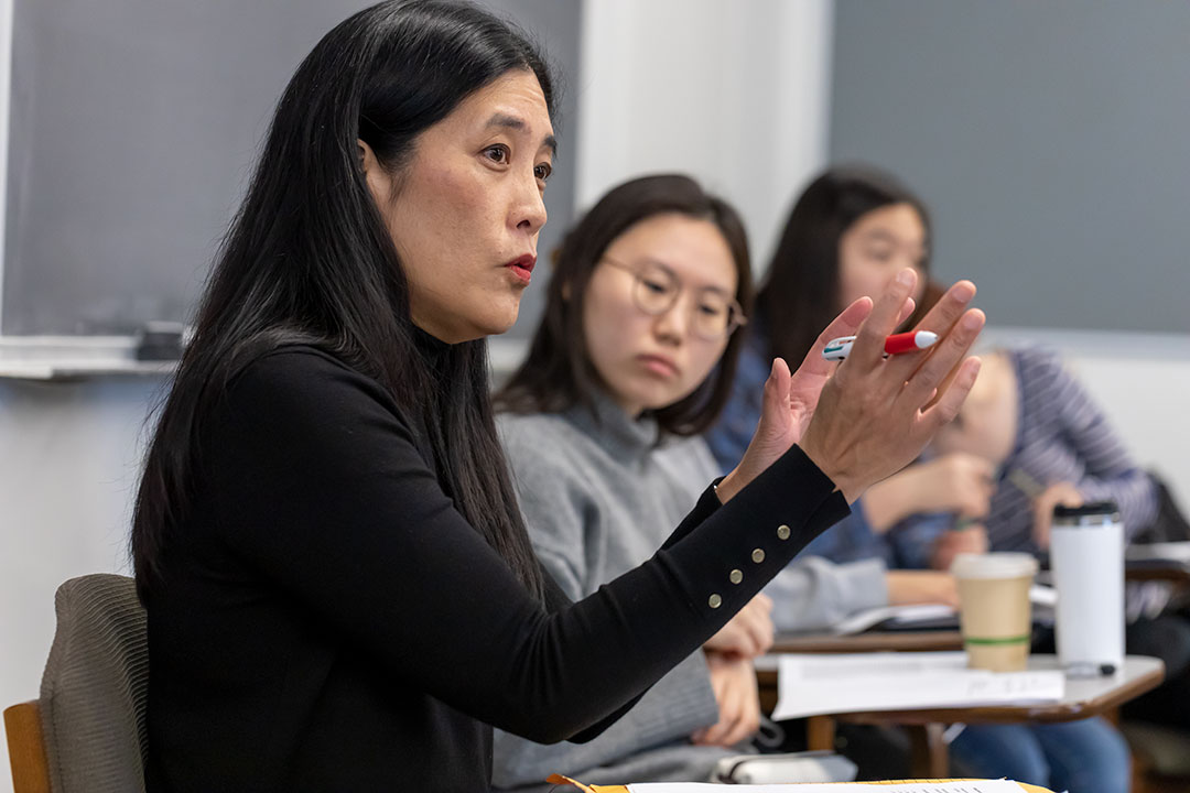 Poet Victoria Change speaks to students in a writing session.