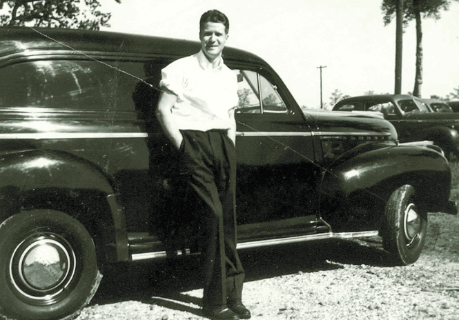 Tom Shepard leaning against his car, circa 1940