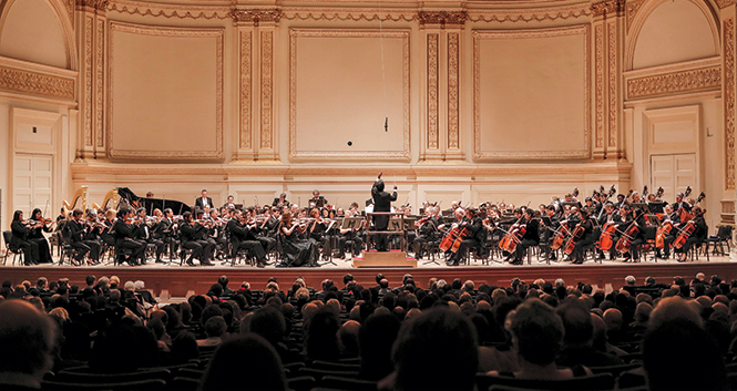George Mathew conducting t Carnegie Hall