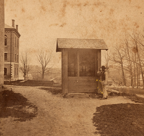 period photograph of a water well on campus