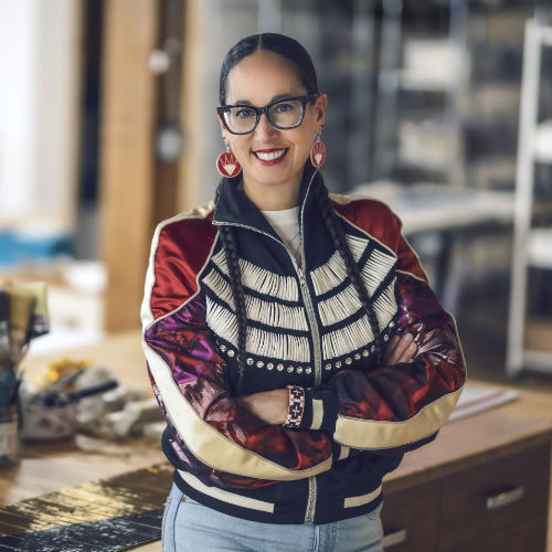 A woman wearing Native American dress