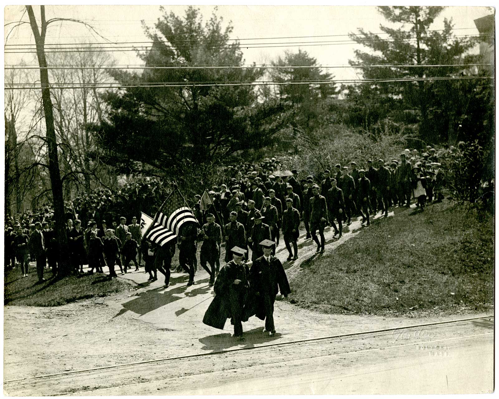 Amherst “Black Cats” Ambulance Unit and Amherst students, following President Meiklejohn and Dean Olds to College Hall, April 19