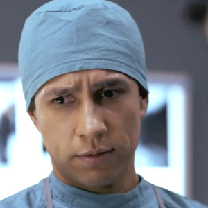 A doctor with a medical cap in an operating room