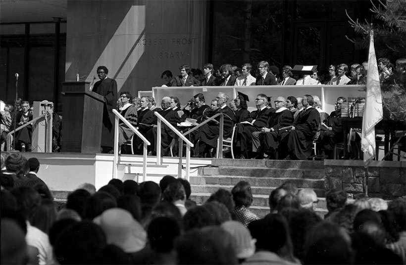George Johnson delivering a commencement address in  1973 in front of Frost Library at Amherst College