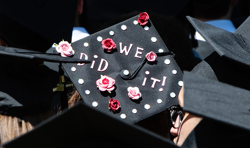 A graduation cap saying We Did It