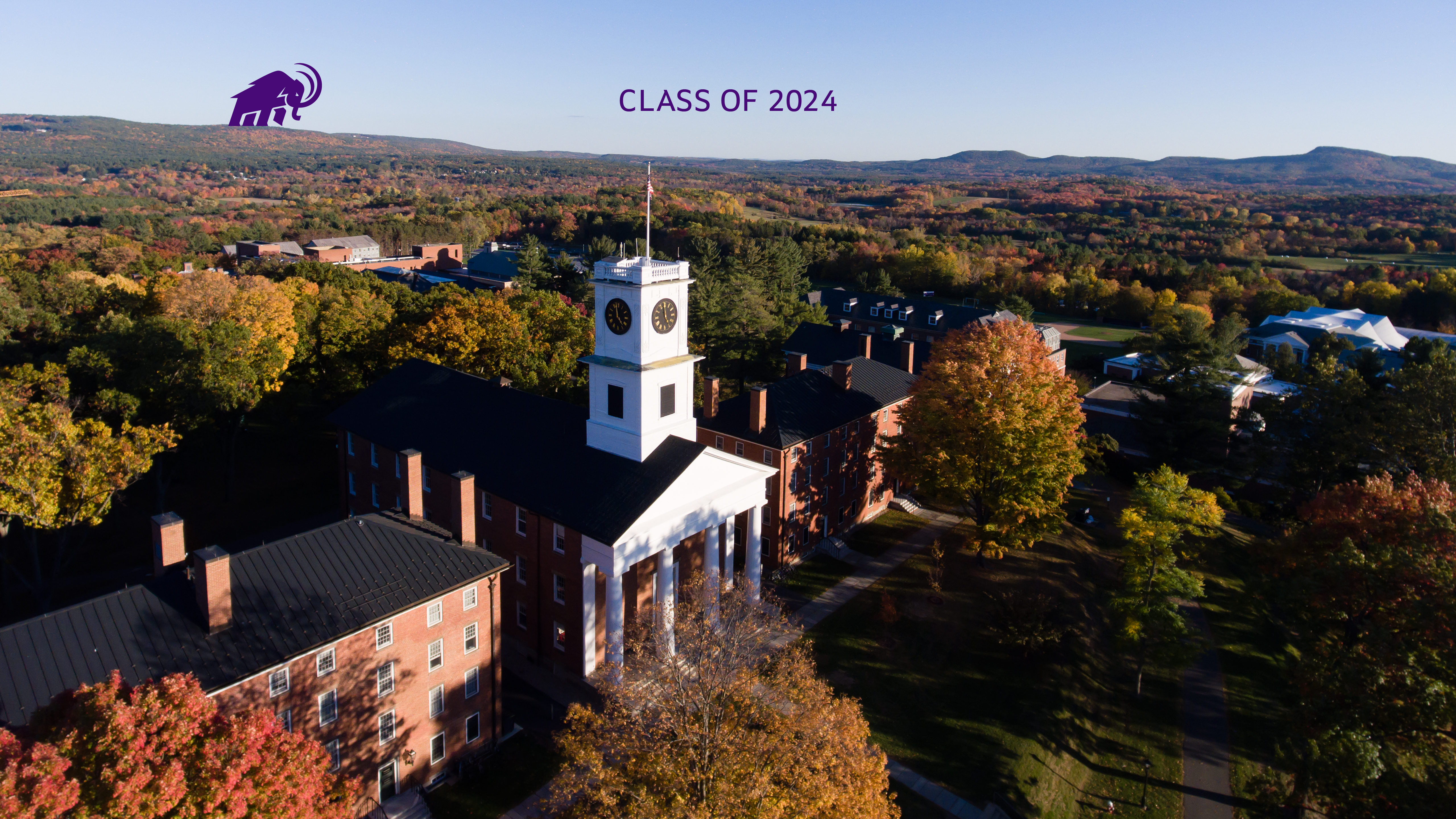 Class of 2024 on an aerial photo of campus showing Johnson Chapel and a mammoth walking on the range