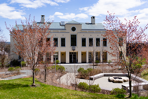 The Keefe campus center in bright spring sunlight