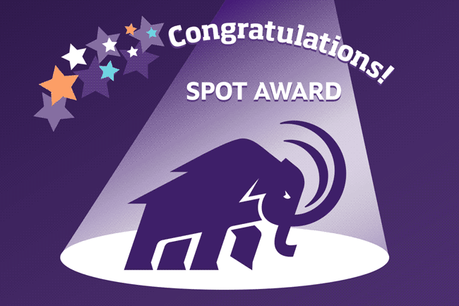 Congratulations! Spot Award. Mammoth stands in a spotlight, with stars overhead.