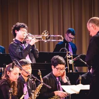 AC Jazz Ensemble musicians playing onstage