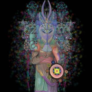 Saya Woolfalk, The Four Virtues (Prudence), 2017: Image of a masked human figure wearing an elaborate and colorful costume, standing in front of a black background