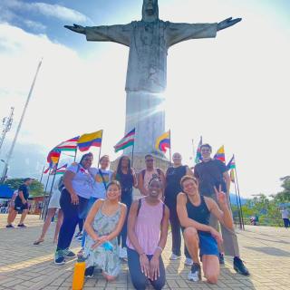 Photo of CET students in the CET Colombia program standing in front of El Cristo Rey in Cali, Colombia.