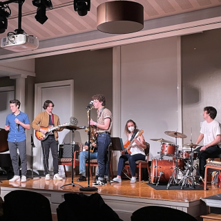 Six student jazz musicians onstage in the Friedmann Room