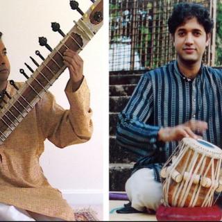 Srinivas Reddy and Nitin Mitta seated and playing their respective instruments