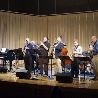 Amherst College jazz faculty playing instruments on the Buckley stage