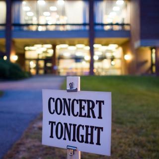"Concert Tonight" sign outside Arms Music Center