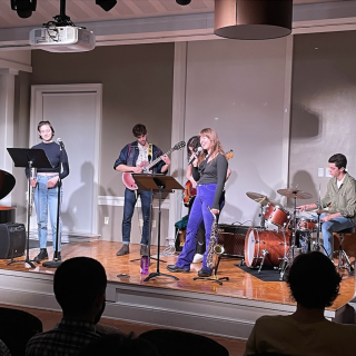 Five student jazz musicians in the Friedmann room