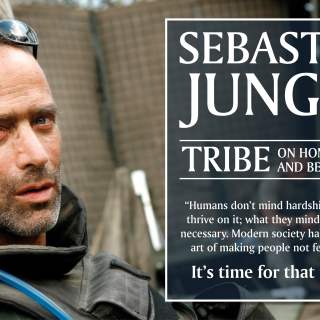 A photo showing Sebastian Junger while embedded with an infantry unit in Afghanistan. Talk title is "Tribe: On Homecoming and Belonging"