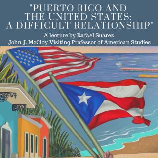 Image Description: picture of event flyer. At the center is an illustration of the ocean and beach with a row of colorful homes to the left, in the foreground is a brown hand holding the United States Flag and the Puerto Rican Flag blowing in the wind. illustration by Gel Jamlang  Image Reads: Puerto Rico and The United States: A Difficult Relationship. A lecture by Rafael Suarez the John J McCloy Visiting Professor of American Studies. Tuesday March, 20 2017 at 6PM to 7PM in the Power House. 