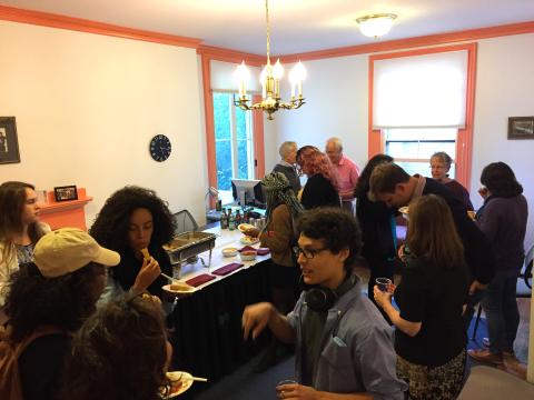 Faculty and students mingling at Fall Reception