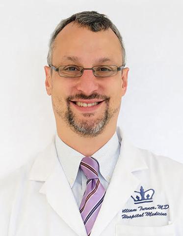 Dr. William Turner in a white medical jacket.