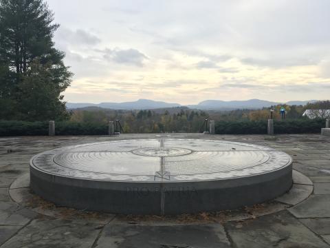 The Amherst College War Memorial with mountains in the background
