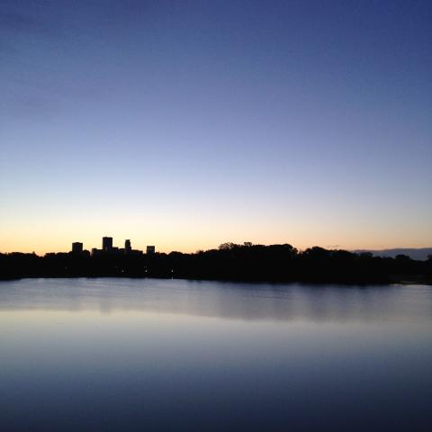 The Minneapolis Skyline with a lake in the foreground