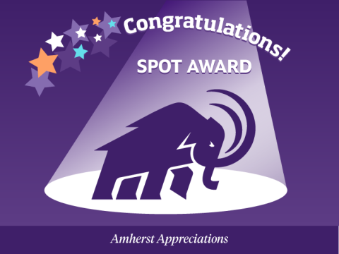 Congratulations! Spot Award. Amherst Appreciations. Mammoth stands in a spotlight.