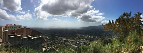a beautiful panorama from the top of a large hill; overlooking Jamaica