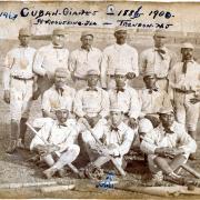 A black and white photo of a baseball team with all Black players