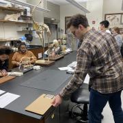 Students working in the geology lab of the museum