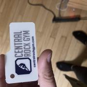 Picture shows a white tag that says in blue text Central Rock Climbing Gym