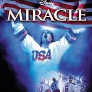 Miracle movie poster showing hockey player wearing USA jersey with hands up in victory