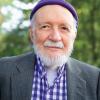 Lou Dolbeare ’40 in purple checked-shirt and purple knit cap
